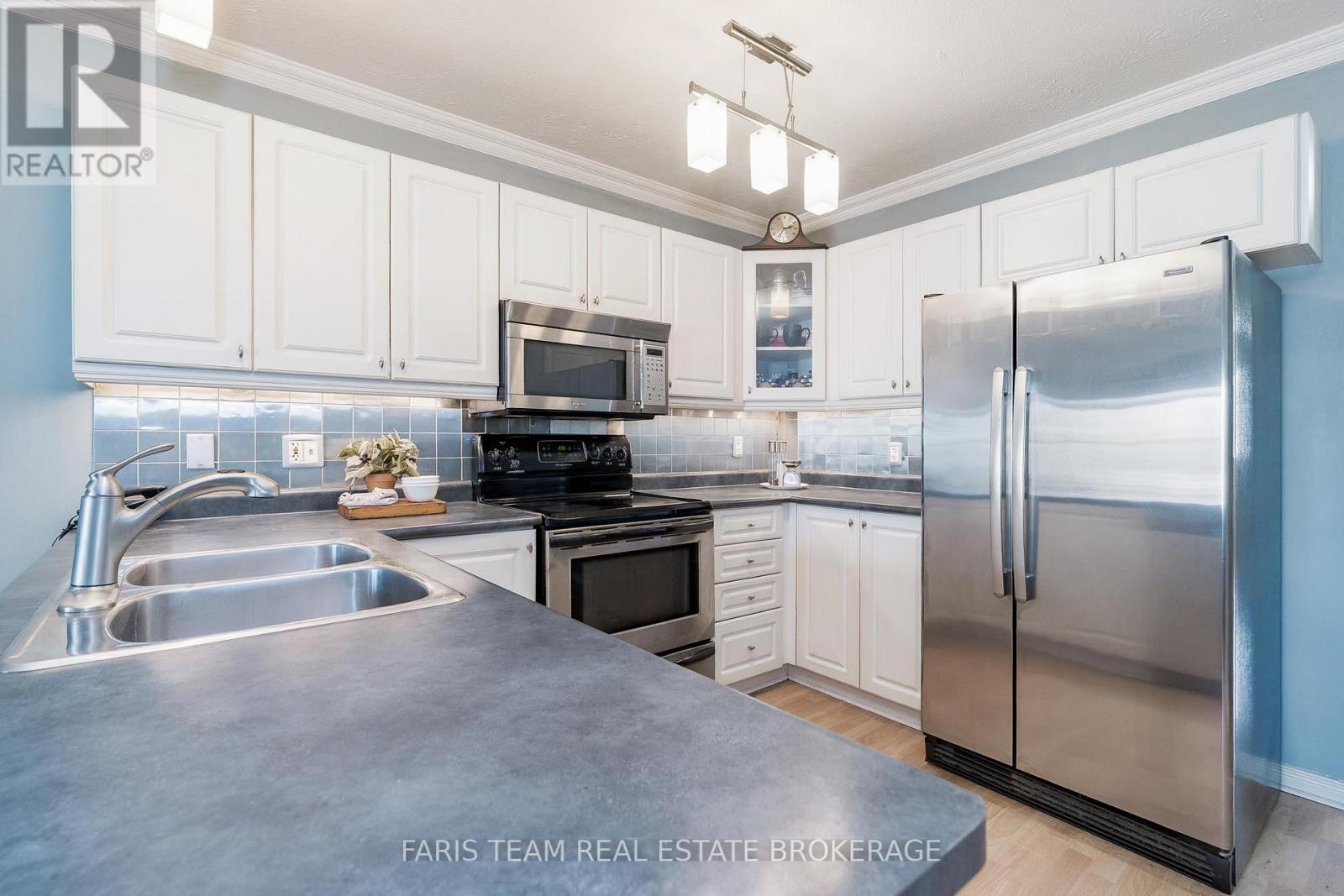 9 Julia Crescent, Orillia, ON - Indoor Photo Showing Kitchen With Double Sink