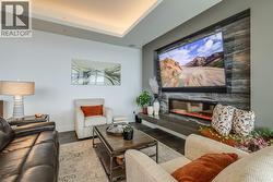 Custom fireplace and lit ceilings -