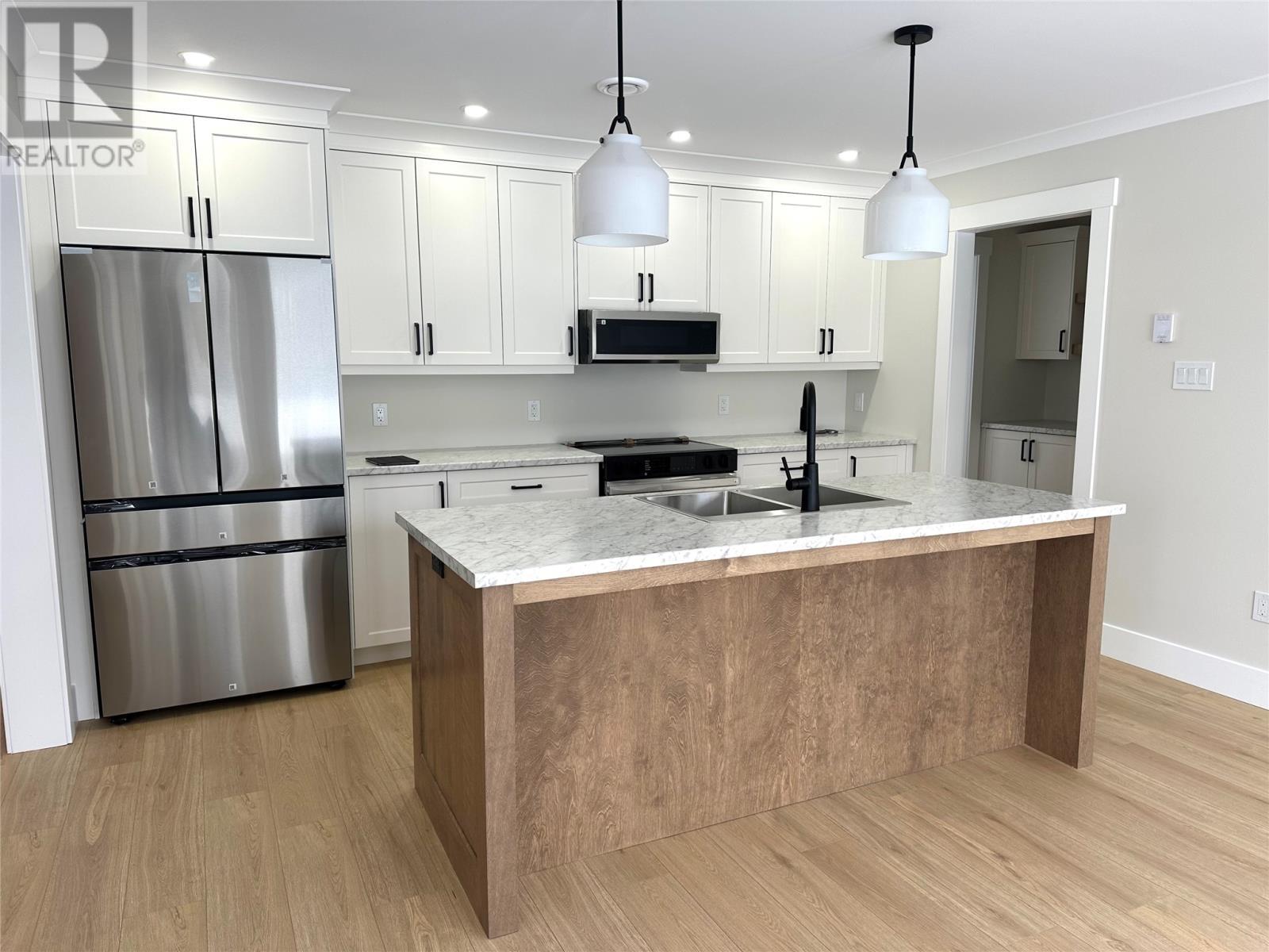 12 Blandford Street, Gander, NL - Indoor Photo Showing Kitchen With Upgraded Kitchen