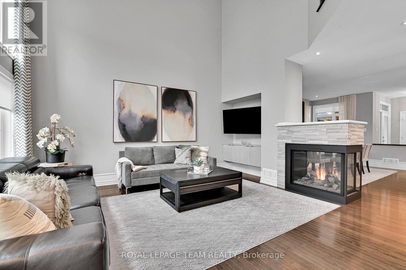 743 Brian Good Avenue, Ottawa, ON - Indoor Photo Showing Living Room With Fireplace