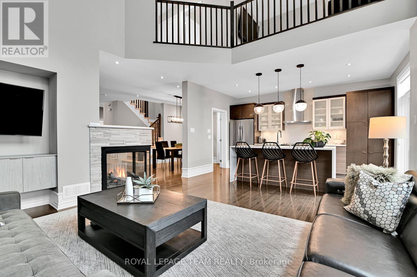 743 Brian Good Avenue, Ottawa, ON - Indoor Photo Showing Living Room With Fireplace