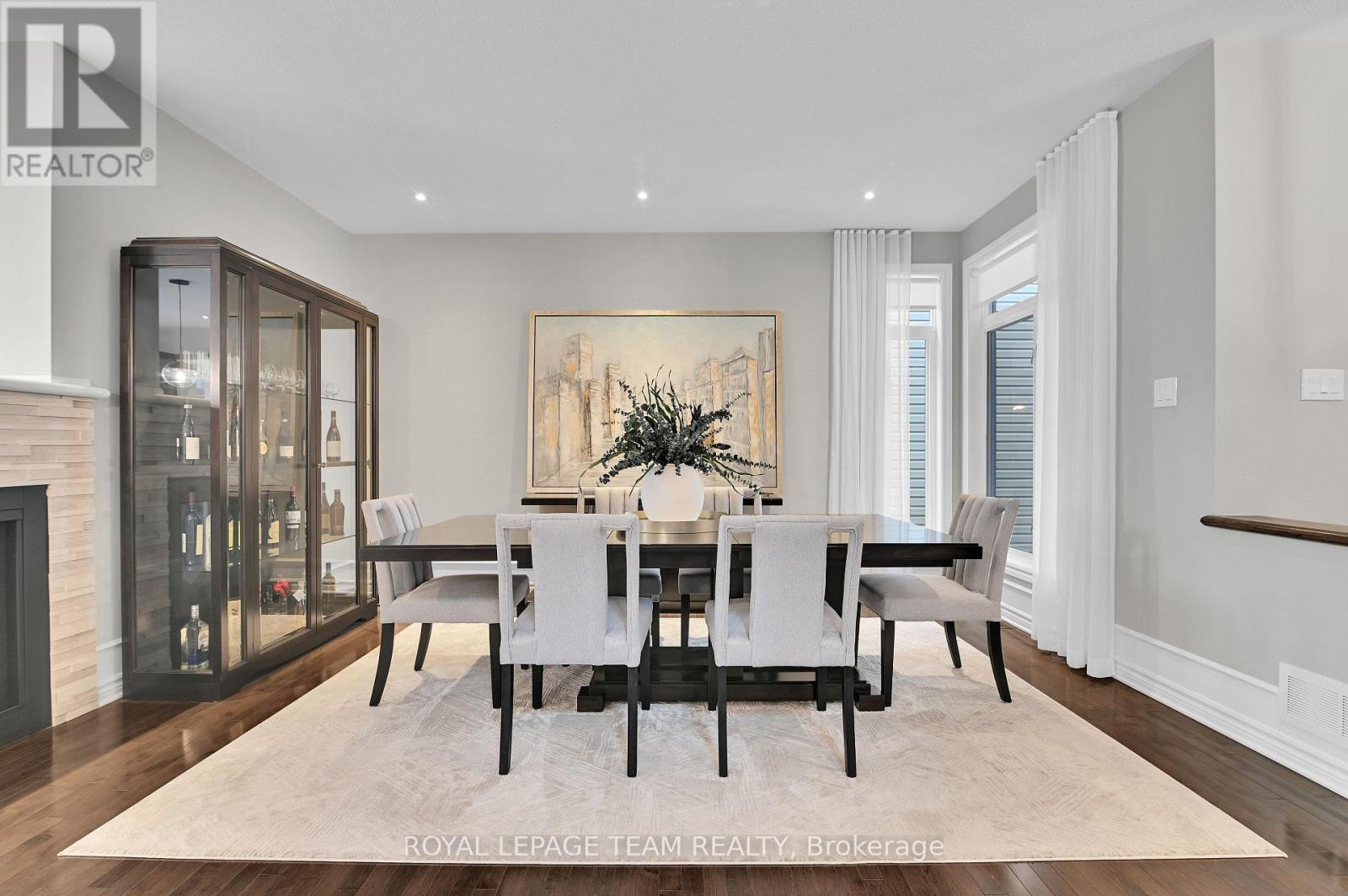 743 Brian Good Avenue, Ottawa, ON - Indoor Photo Showing Dining Room With Fireplace