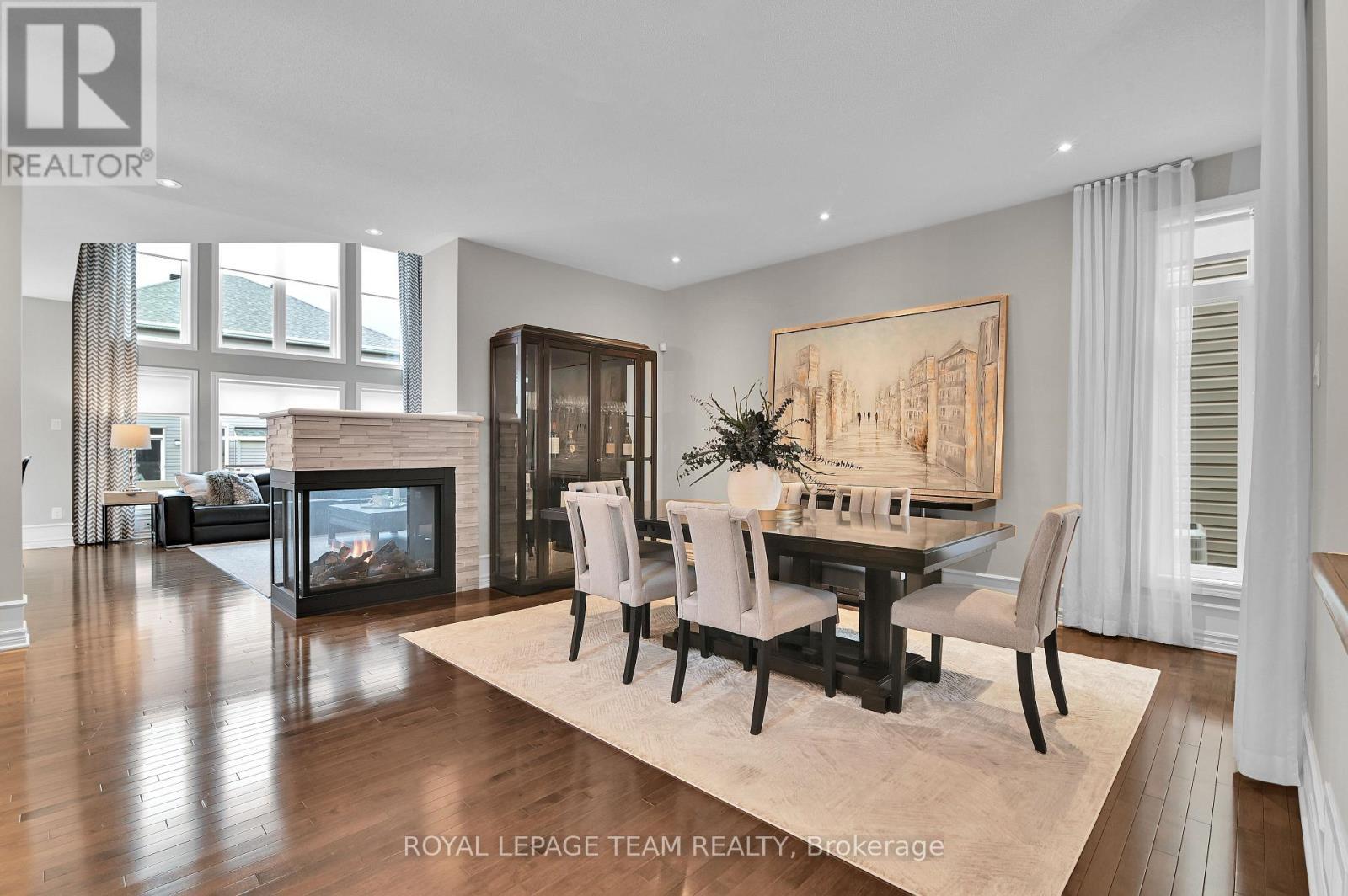 743 Brian Good Avenue, Ottawa, ON - Indoor Photo Showing Dining Room With Fireplace