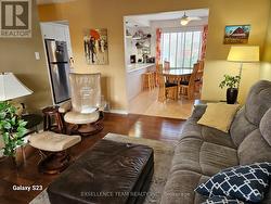 Living rm diff angle overlooking dining rm/kitchen -