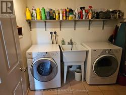 Laundry. Ceramic floor. -