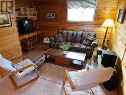 Lower lever family room combined with exercise rm -