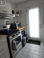 Kitchen terrace door to rear deck. -