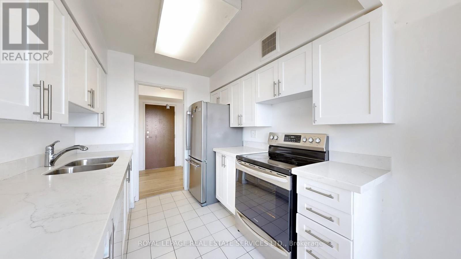 1111 - 50 Kingsbridge Garden, Mississauga, ON - Indoor Photo Showing Kitchen With Double Sink