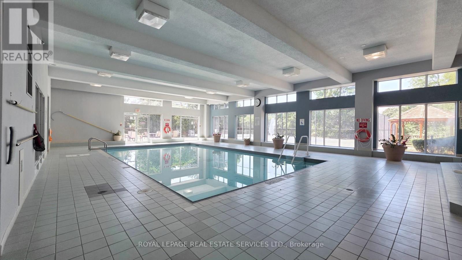 1111 - 50 Kingsbridge Garden, Mississauga, ON - Indoor Photo Showing Other Room With In Ground Pool