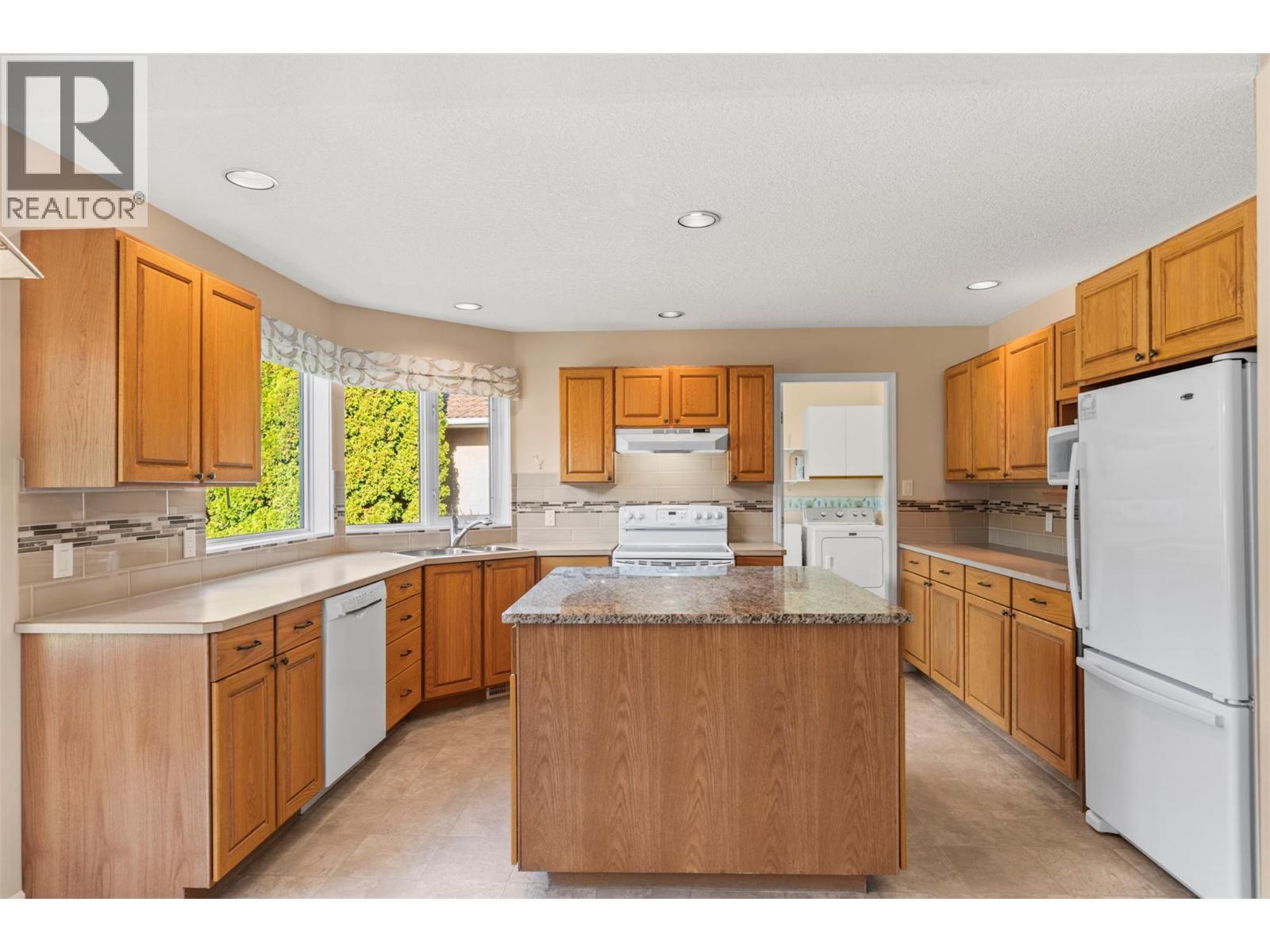 240 Country Estate Drive, Vernon, BC - Indoor Photo Showing Kitchen With Double Sink