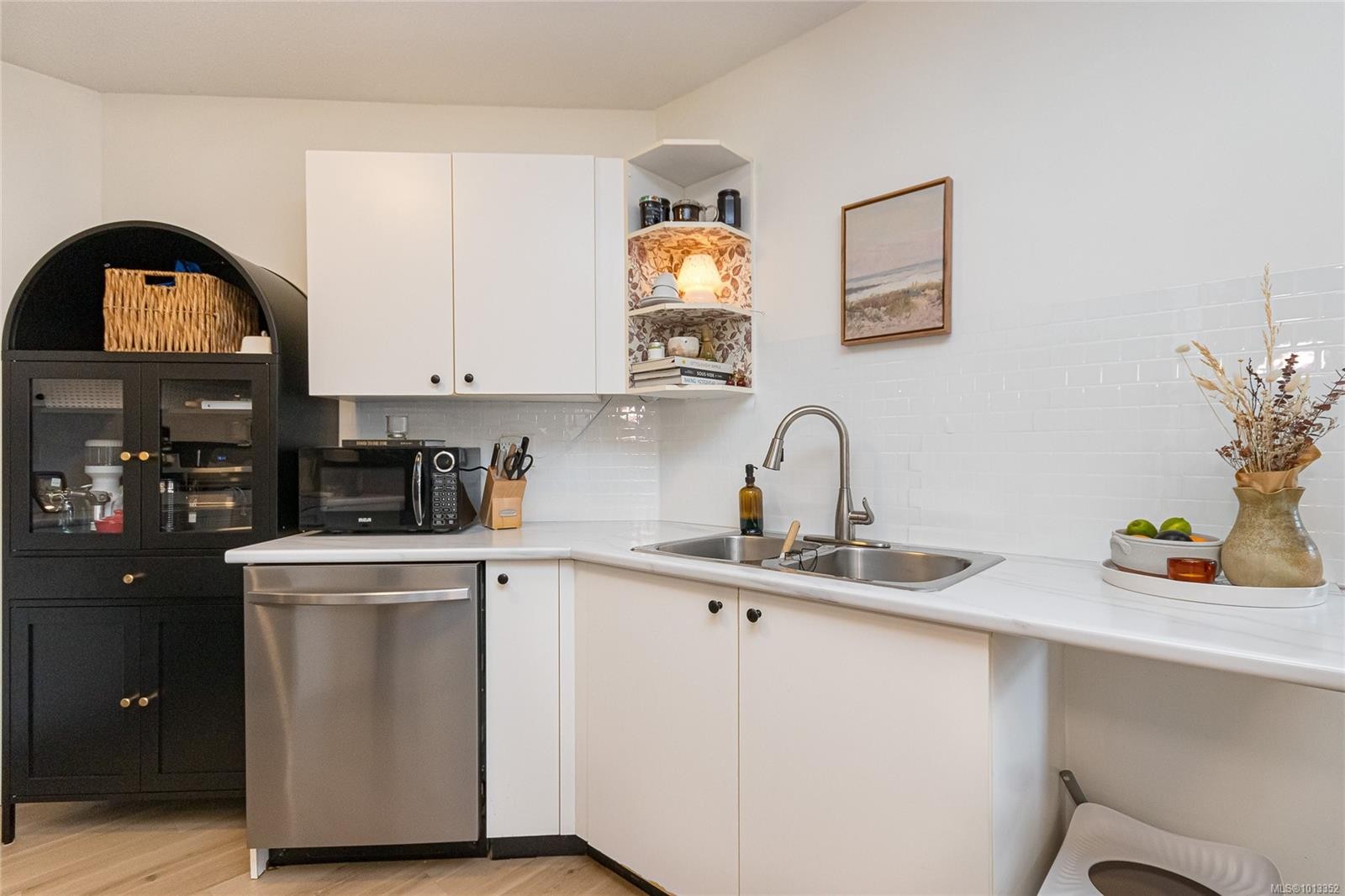 410-2560 Wark St, Victoria, BC - Indoor Photo Showing Kitchen With Double Sink