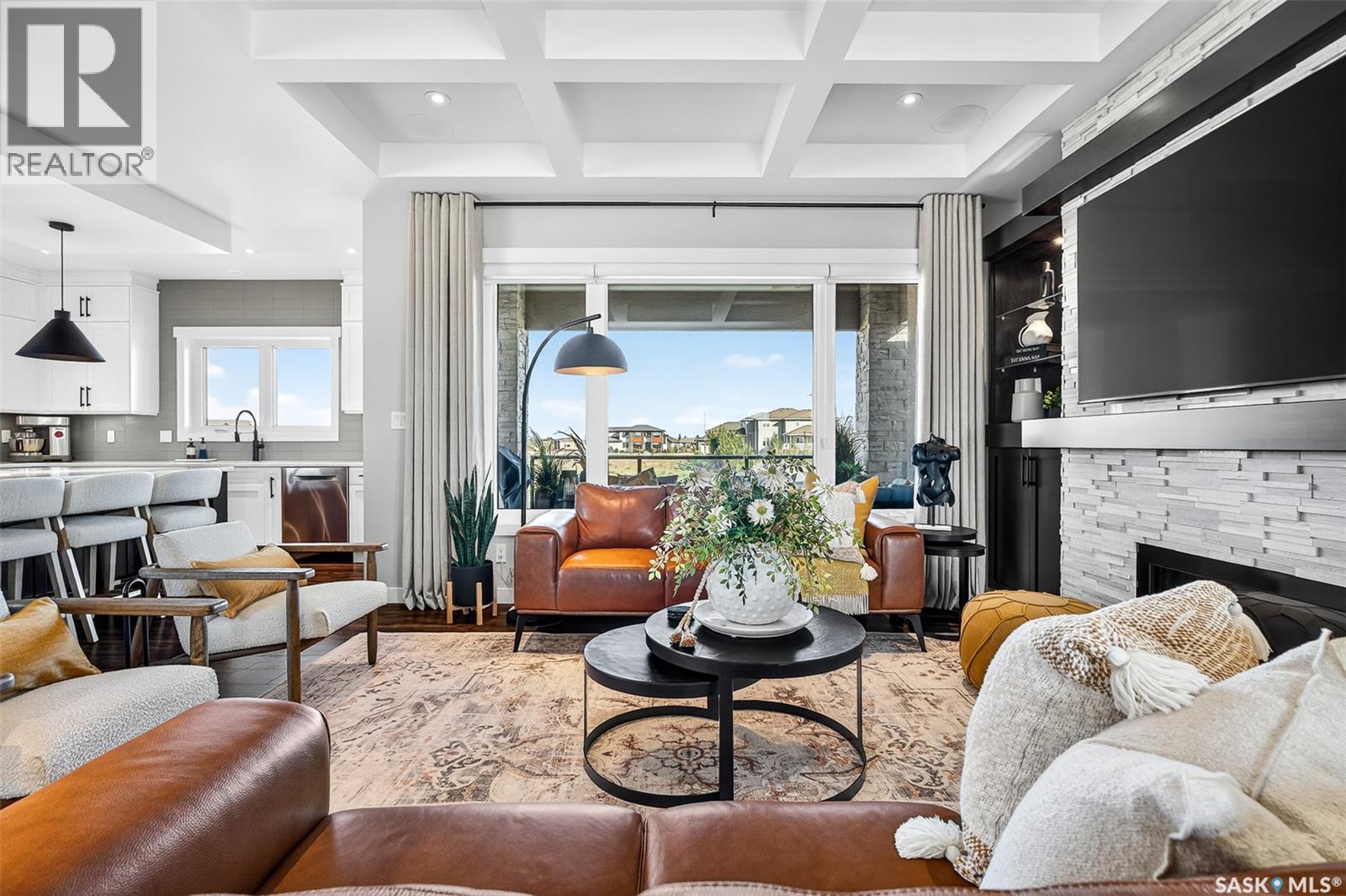 127 Iron Bridge Drive, Moose Jaw, SK - Indoor Photo Showing Living Room With Fireplace