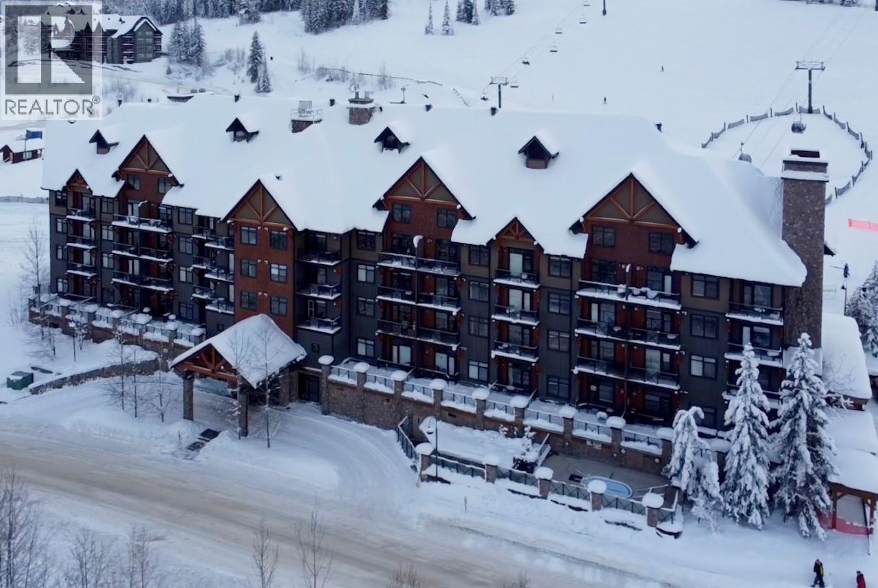 1549 Kicking Horse Trail Unit# 415 (A&B), Golden, BC - Outdoor With Balcony With Facade