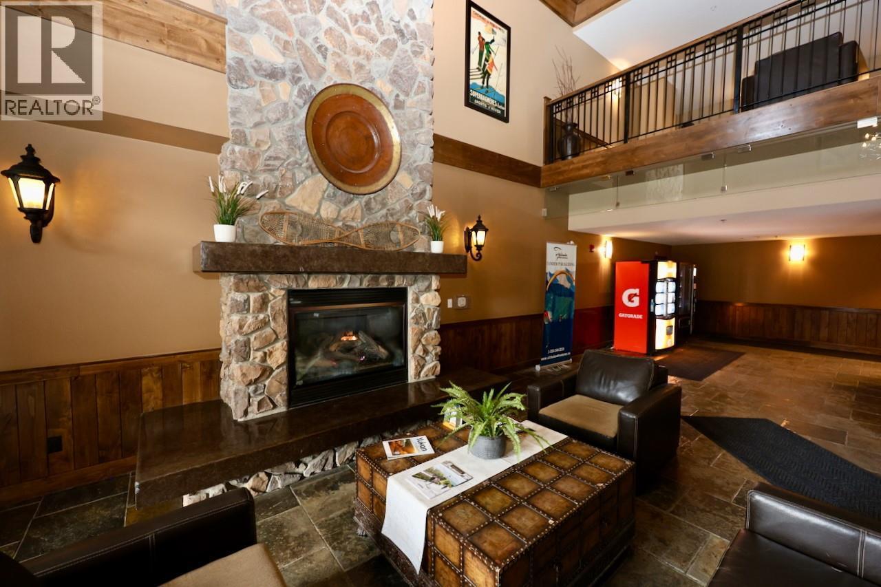 1549 Kicking Horse Trail Unit# 415 (A&B), Golden, BC - Indoor With Fireplace