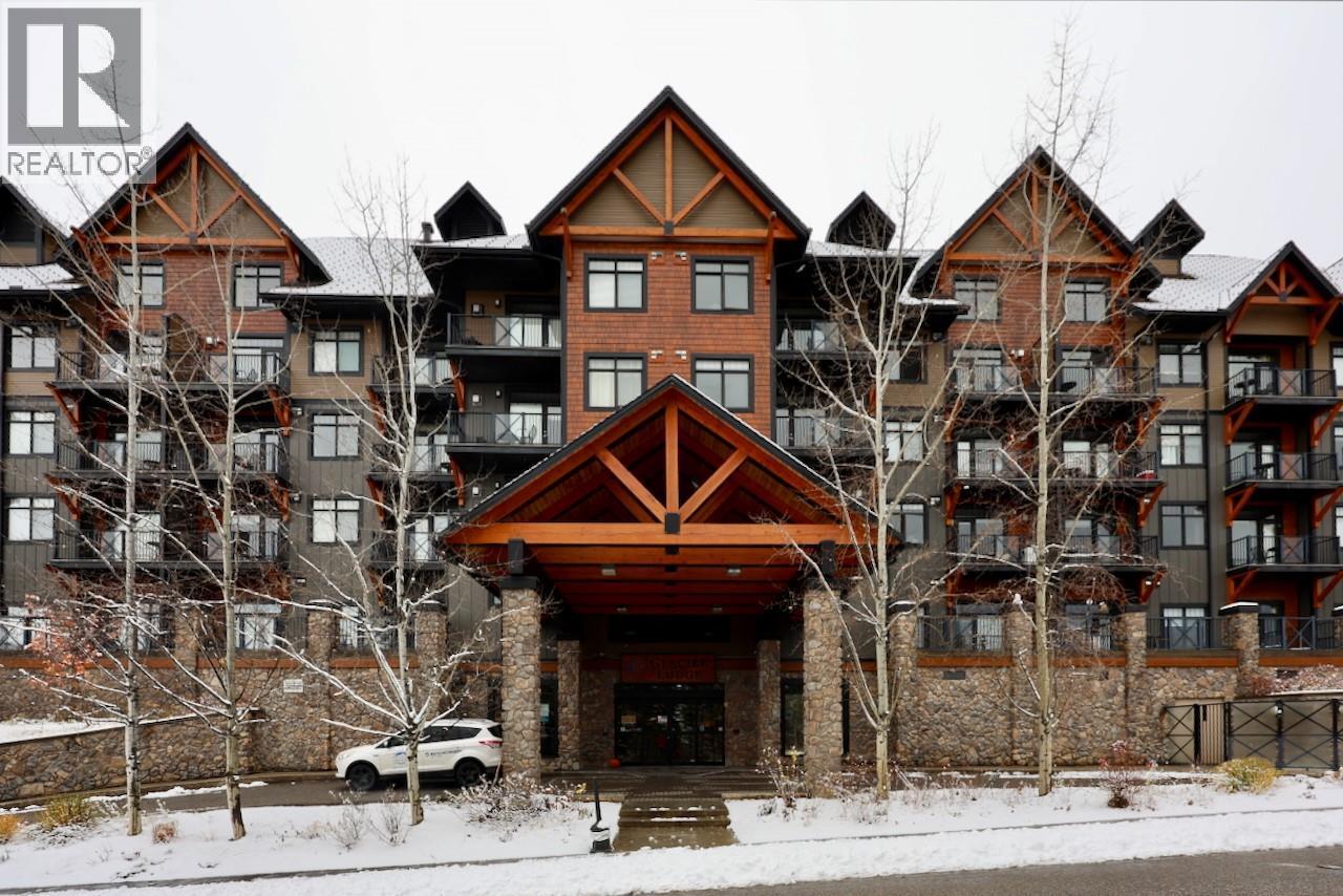 1549 Kicking Horse Trail Unit# 415 (A&B), Golden, BC - Outdoor With Balcony With Facade