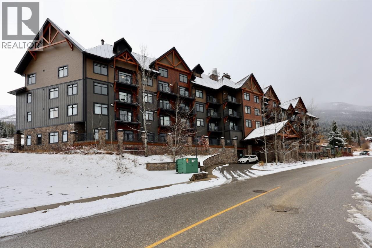 1549 Kicking Horse Trail Unit# 415 (A&B), Golden, BC - Outdoor With Balcony With Facade