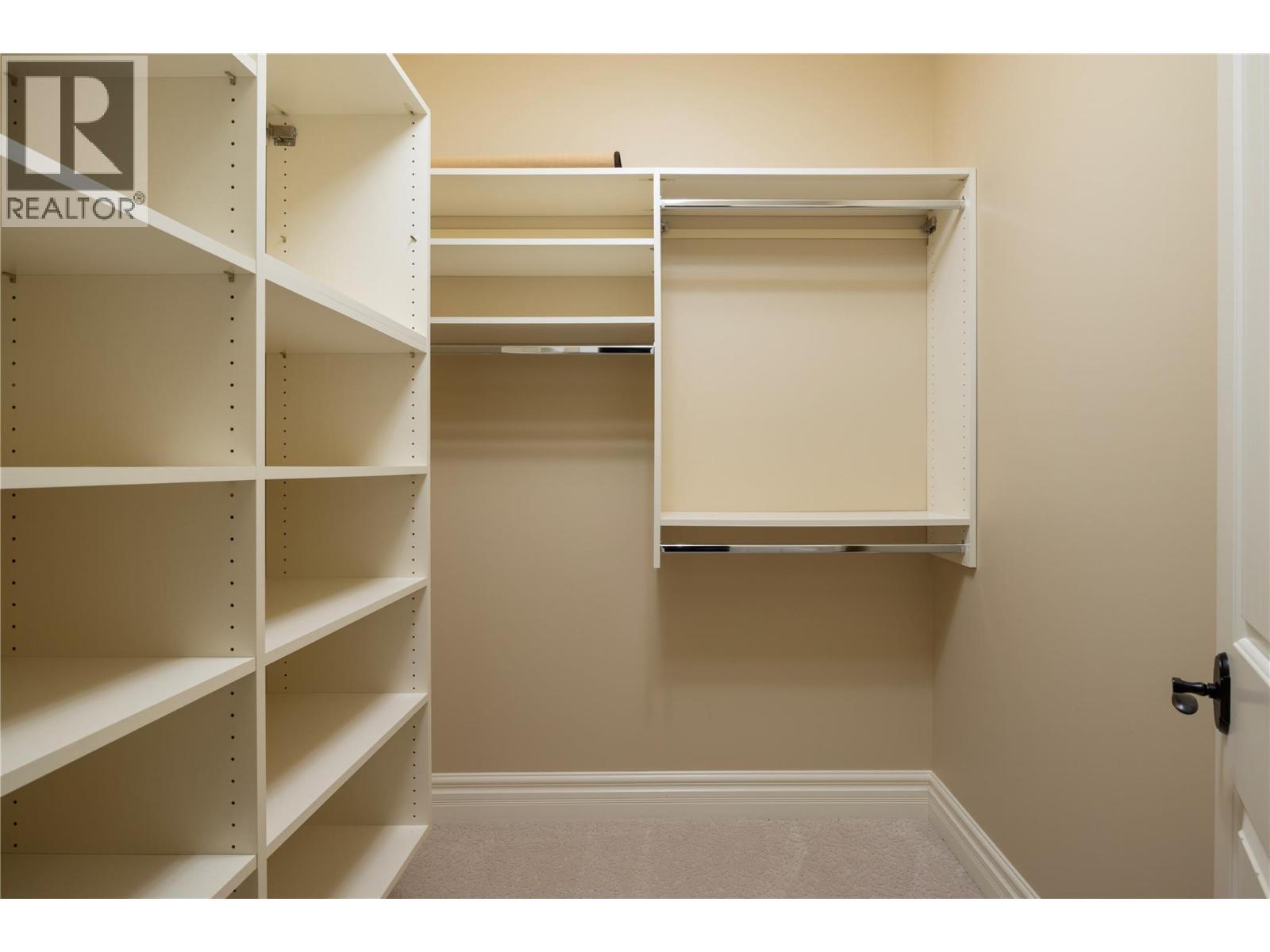 Primary Walk in Closet - 108 Vineyard Way, Vernon, BC - Indoor With Storage