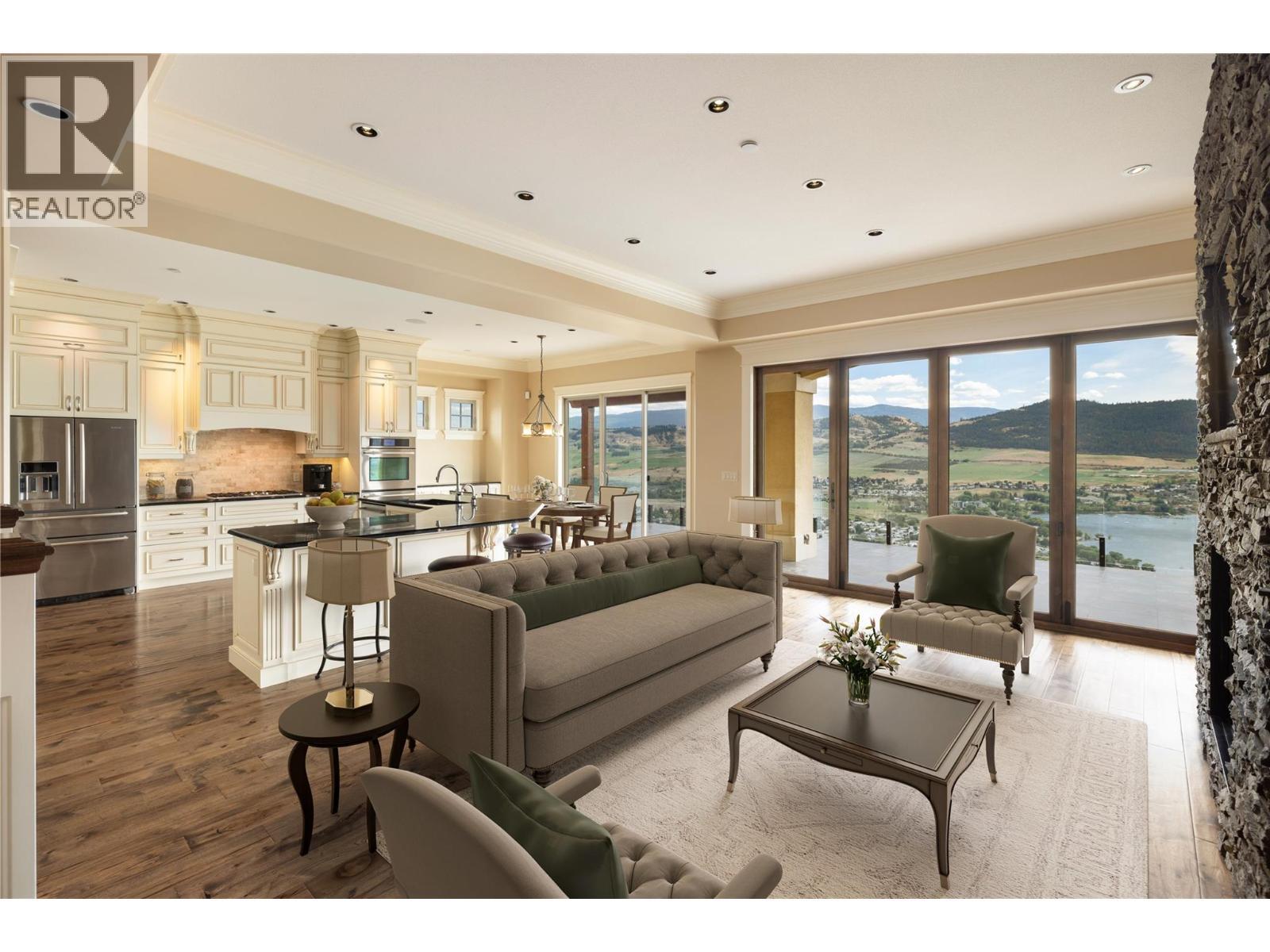 Virtually Staged - Main floor living room, open kitchen and dining area - 108 Vineyard Way, Vernon, BC - Indoor Photo Showing Living Room