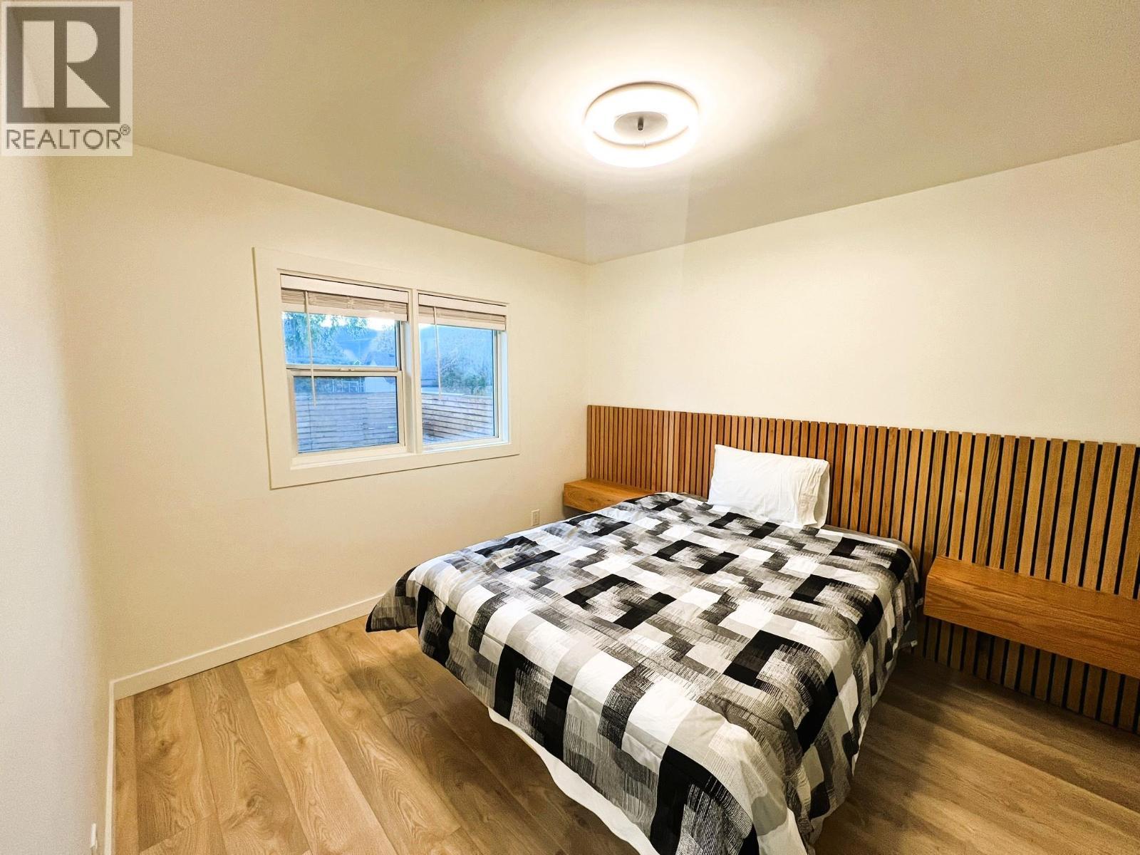 Bedroom - Main House - 2174 Richter Avenue, Kelowna, BC - Indoor Photo Showing Bedroom