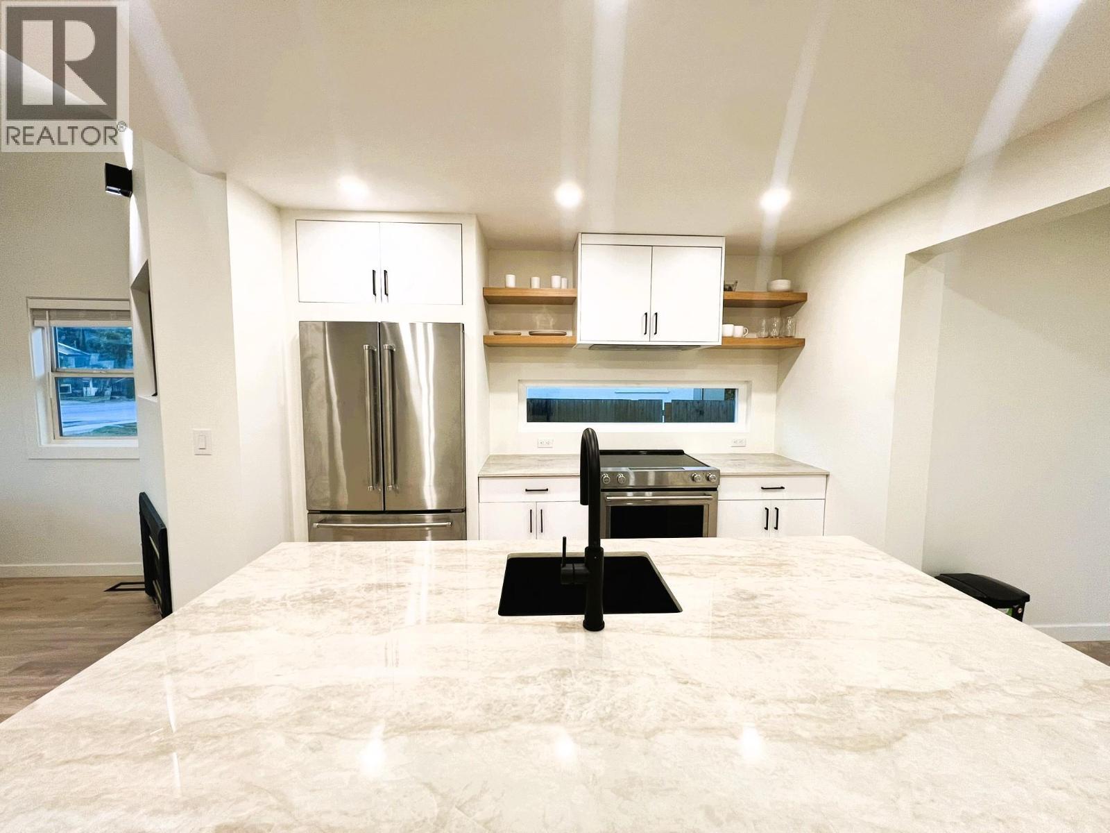 Kitchen - Main House - 2174 Richter Avenue, Kelowna, BC - Indoor Photo Showing Kitchen With Double Sink