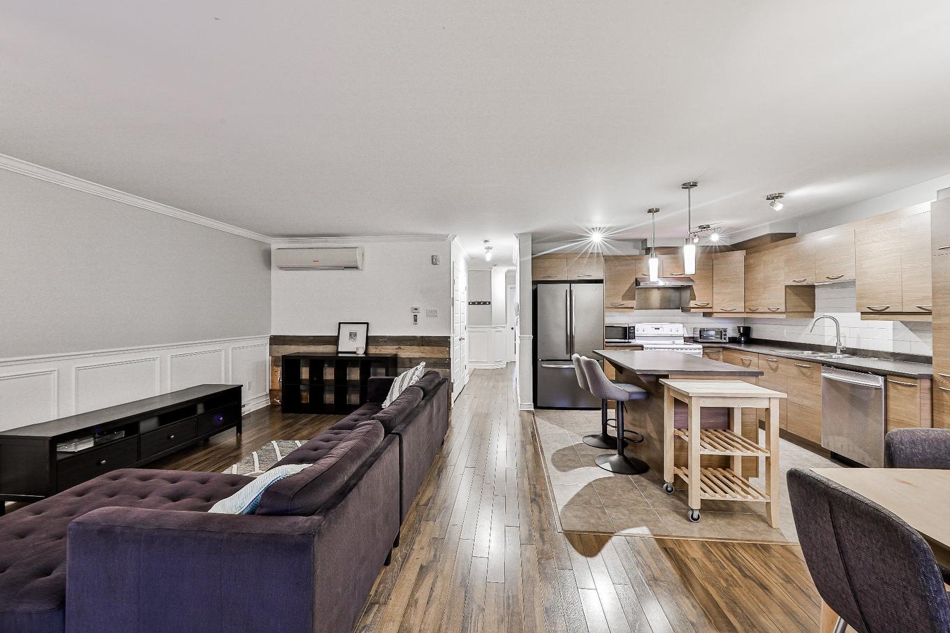 Overall view - 103-2405 Rue Versailles, Mascouche, QC - Indoor With Fireplace