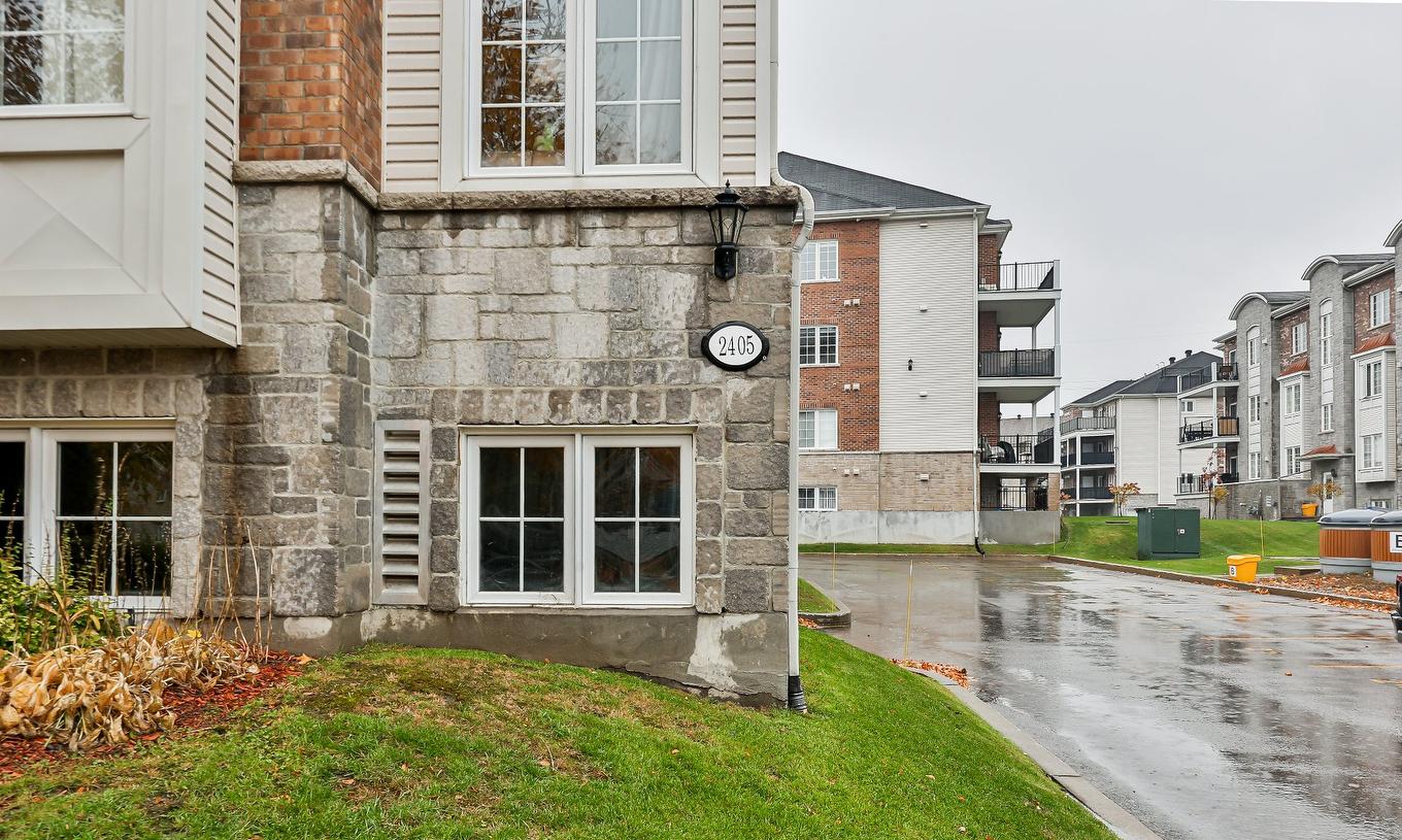 Exterior - 103-2405 Rue Versailles, Mascouche, QC - Outdoor With Facade
