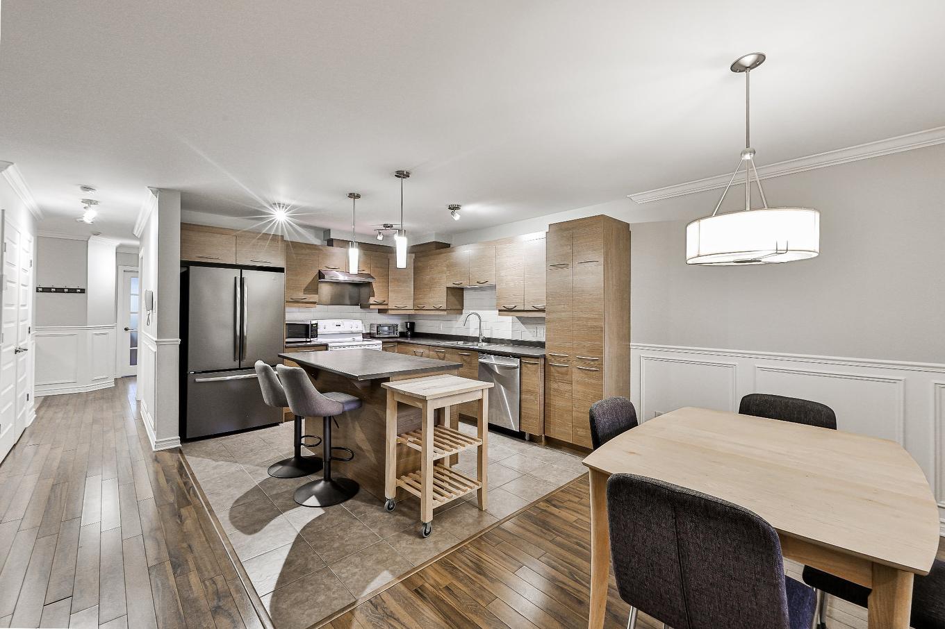 Kitchen - 103-2405 Rue Versailles, Mascouche, QC - Indoor Photo Showing Other Room