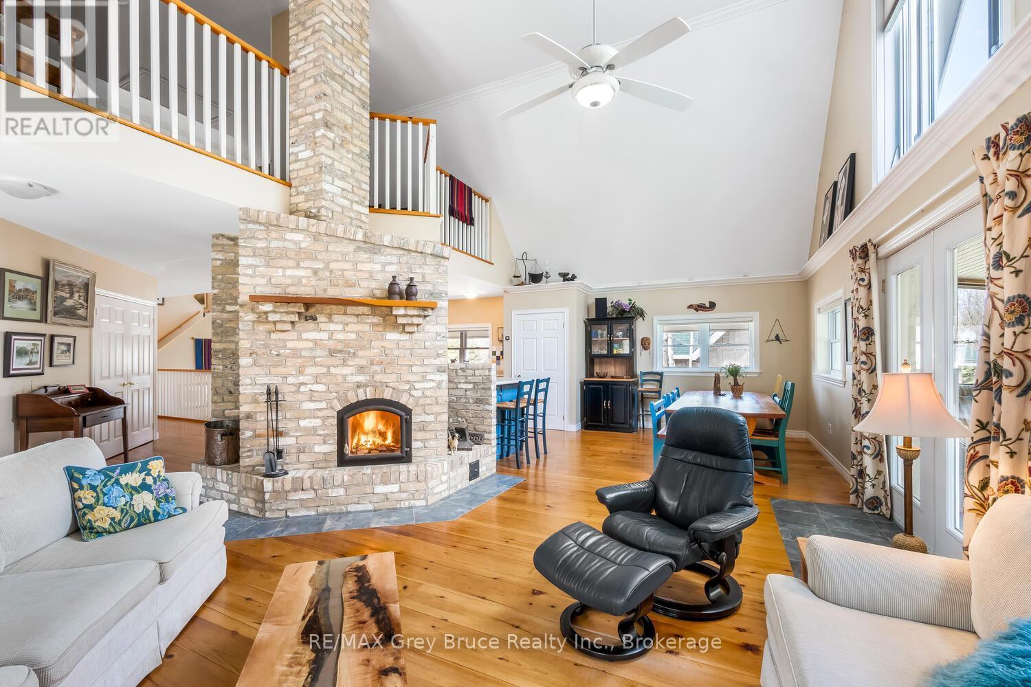 20 Maple Drive, Northern Bruce Peninsula, ON - Indoor Photo Showing Living Room With Fireplace