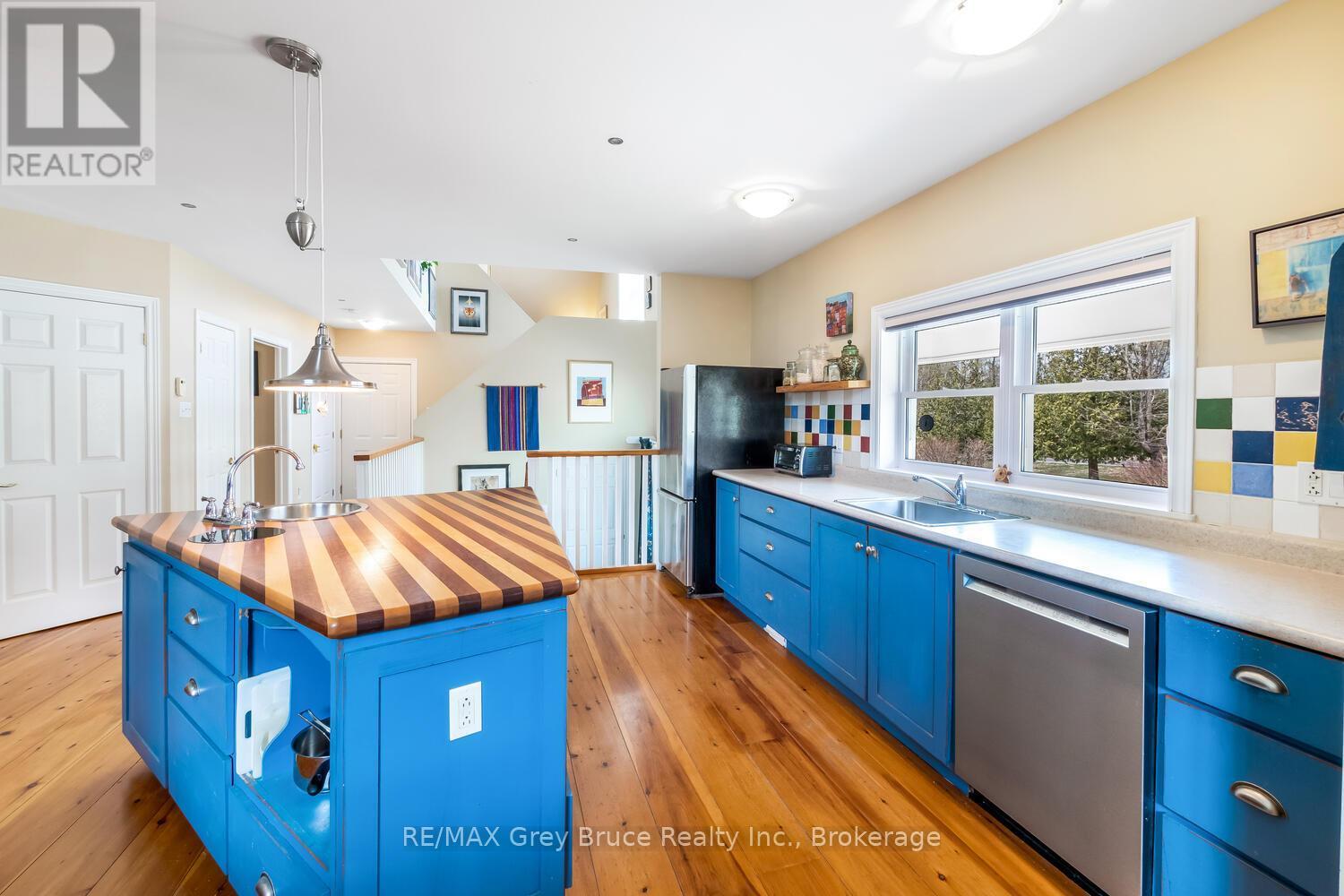 Island counter in kitchen - 20 Maple Drive, Northern Bruce Peninsula, ON - Indoor Photo Showing Kitchen With Double Sink