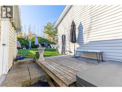 PATIO - Nice shaded deck area in side yard. -