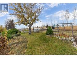 BACK YARD - Backs onto quiet orchard. -