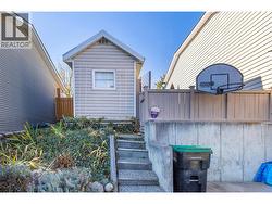 Steps from driveway to back yard. -