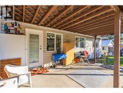 PATIO - Covered pergola over concrete patio. -