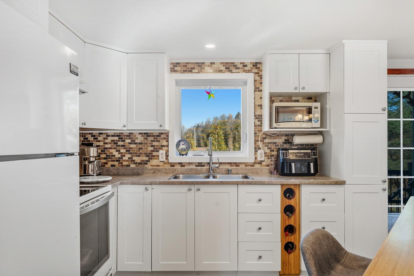 Cuisine - 8064 Route Sir-Wilfrid-Laurier, Mirabel, QC - Indoor Photo Showing Kitchen With Double Sink