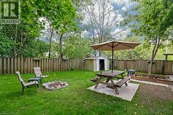 View of yard with a fire pit -
