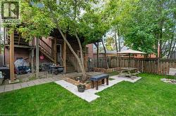 View of yard featuring stairway and a patio area -