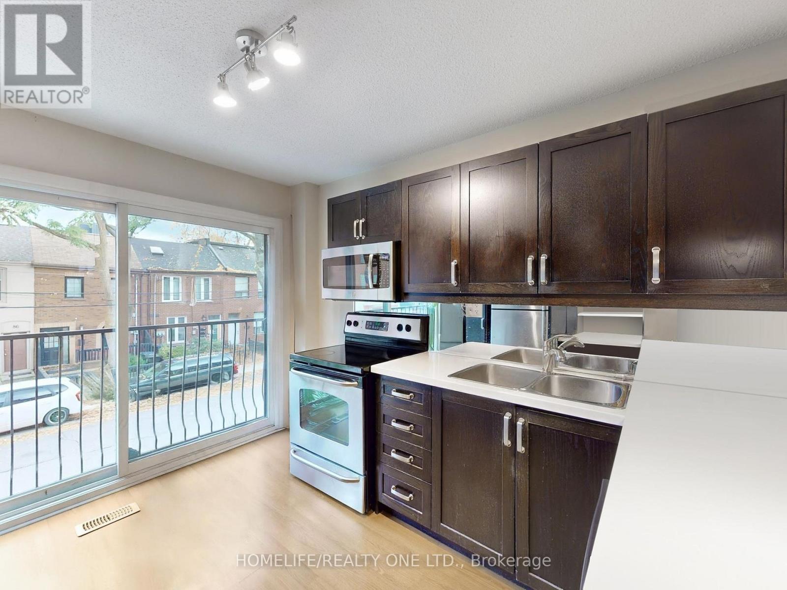 77 Tecumseth Street, Toronto, ON - Indoor Photo Showing Kitchen With Double Sink