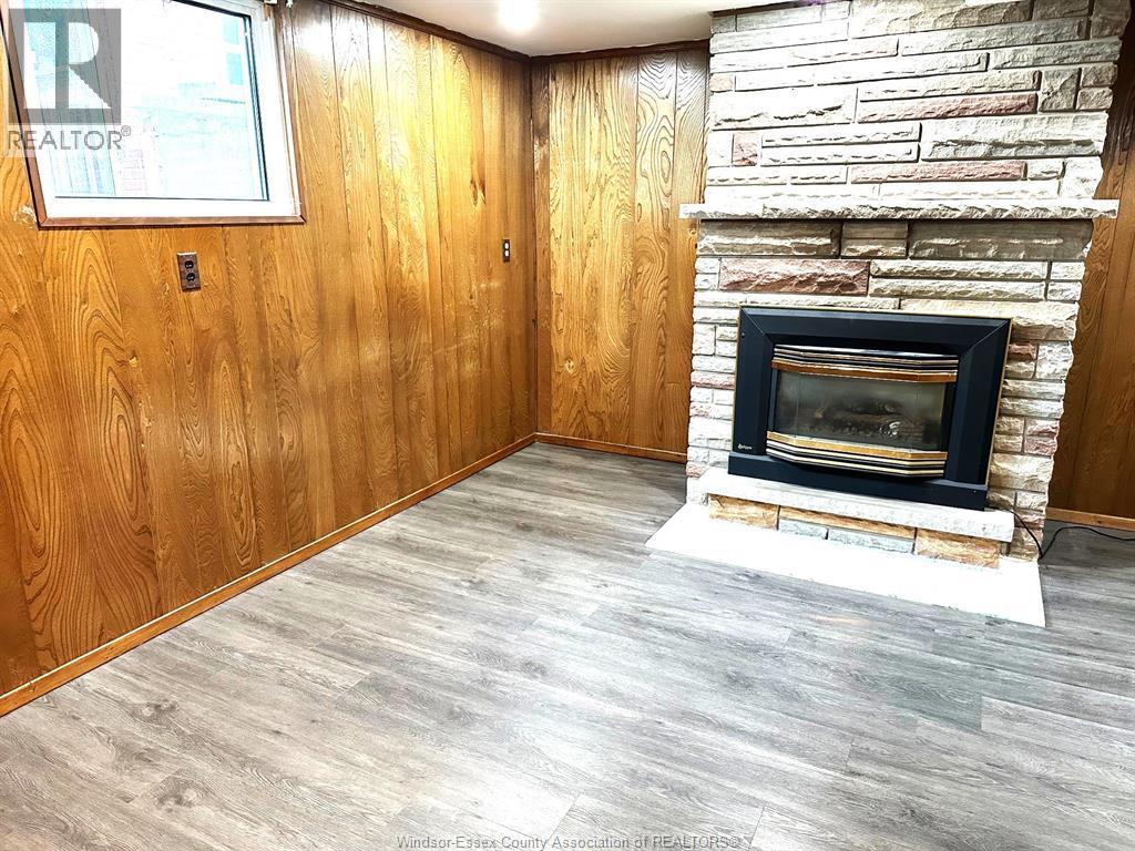 3551 Woodland, Windsor, ON - Indoor Photo Showing Living Room With Fireplace