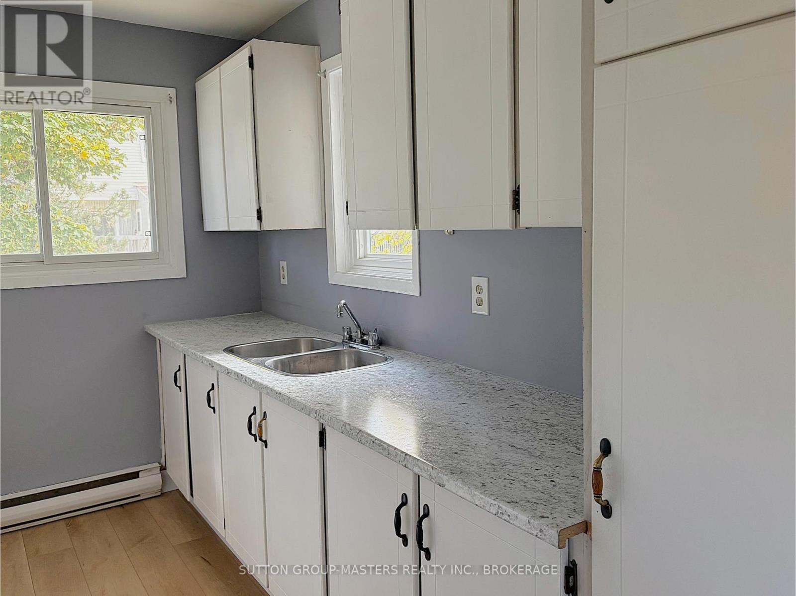 301 - 1000 Pembridge Crescent, Kingston (North Of Taylor-Kidd Blvd), ON - Indoor Photo Showing Kitchen With Double Sink