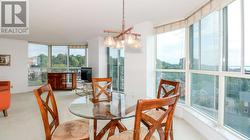 Overlooking treed neighbourhoods and lake -