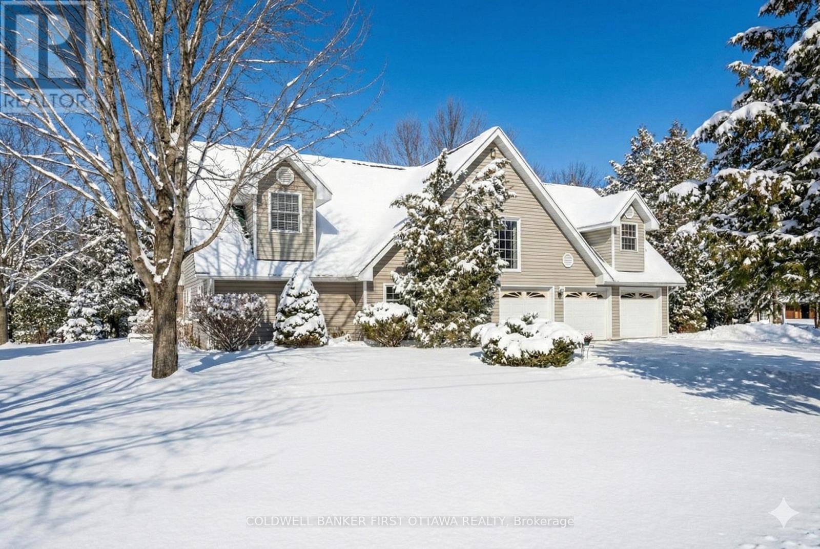 Detached garage has luxury apartment & 4000sf loft - 320 Pike Lake Route 12 Road, Tay Valley, ON - Outdoor With Facade