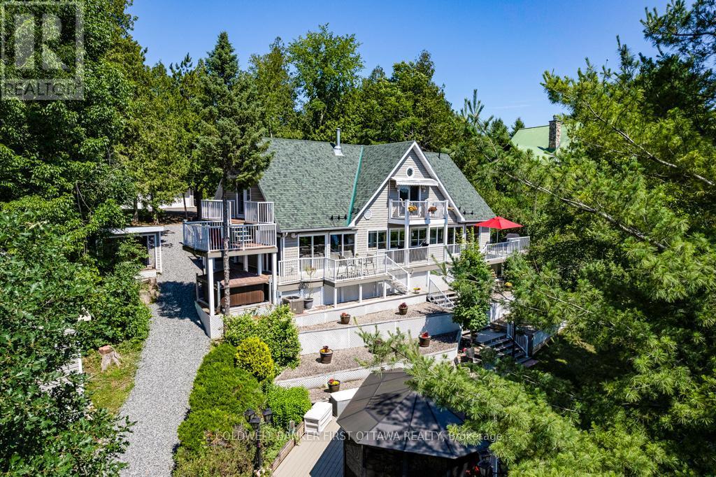 Summer view - picture perfect - 320 Pike Lake Route 12 Road, Tay Valley, ON - Outdoor With Deck Patio Veranda