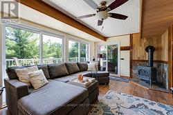 Livingroom views of lake from wall of windows -