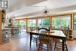Dining room open to kitchen with slate flooring -