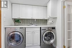 Laundryroom walls of storage & pullout drying rack -