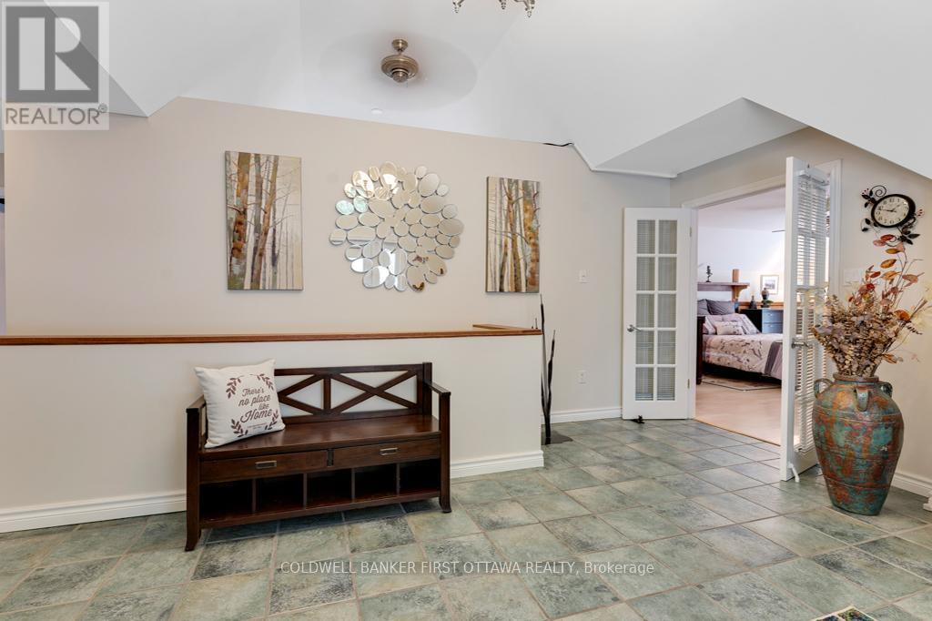 Upper level landing - 320 Pike Lake Route 12 Road, Tay Valley, ON - Indoor Photo Showing Other Room