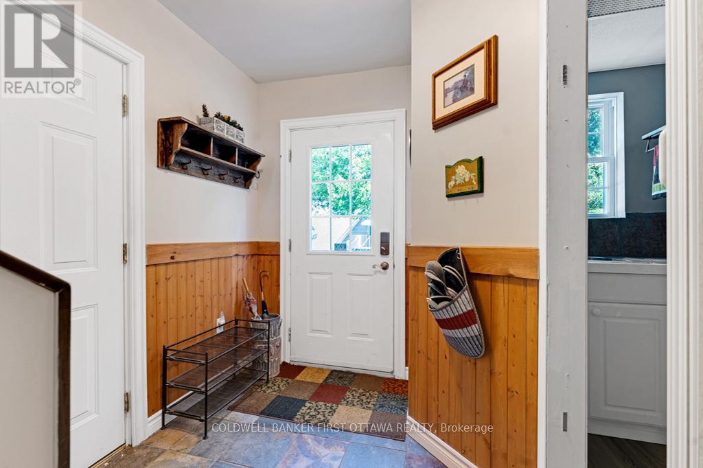 Separate entry from garage to apartment - 320 Pike Lake Route 12 Road, Tay Valley, ON - Indoor Photo Showing Other Room