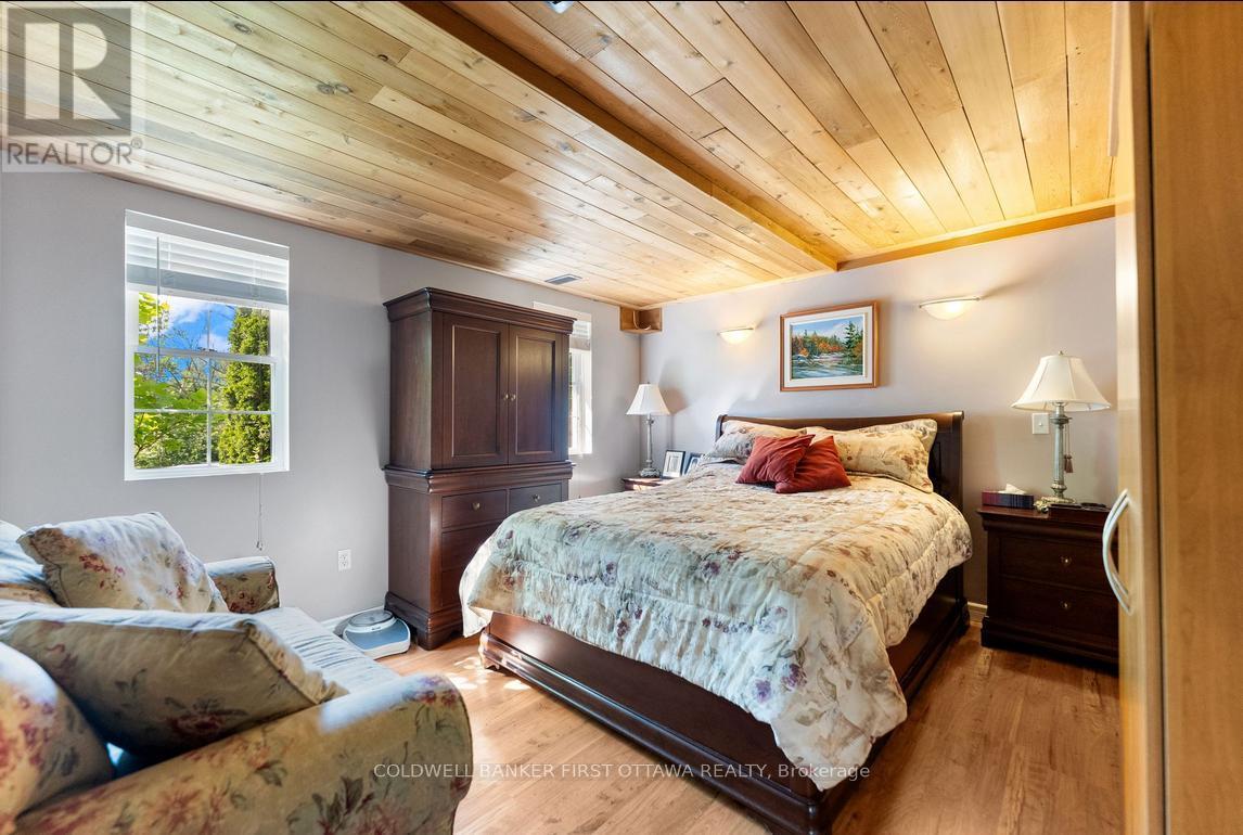 Apartment large bedroom - 320 Pike Lake Route 12 Road, Tay Valley, ON - Indoor Photo Showing Bedroom