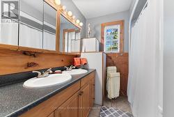 Apartment bathroom with double sink vanity -