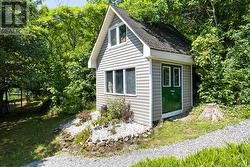 Bunkie with entry to garage and its loft -